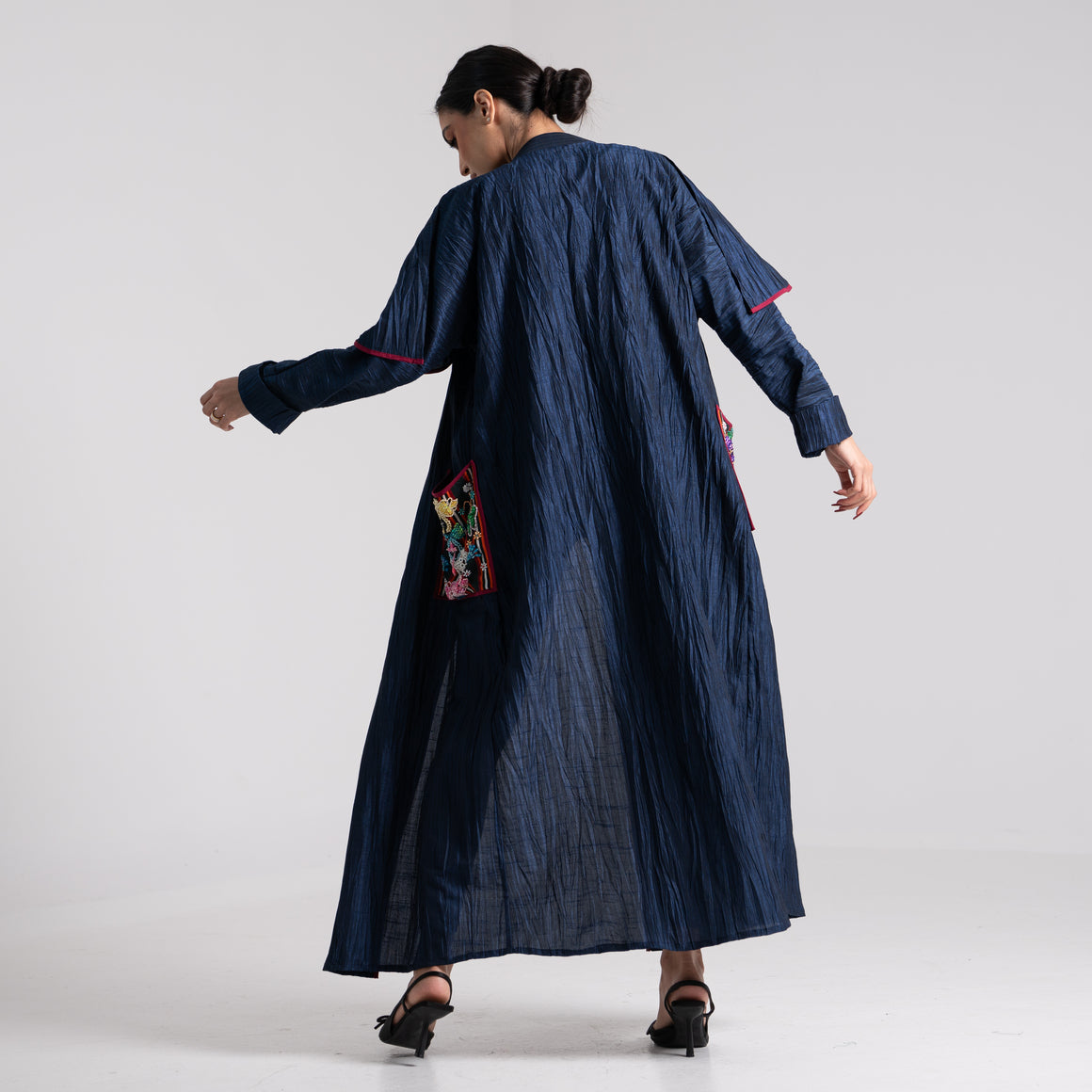 DALSH DESIGNS - Pleated coat with siwa embroidery