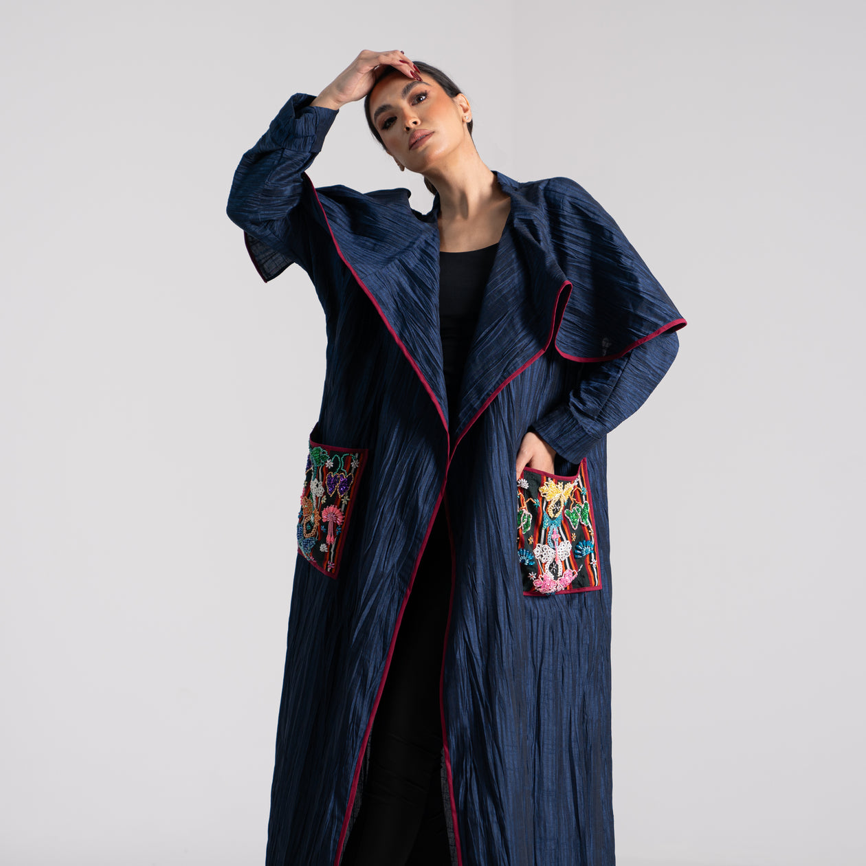 DALSH DESIGNS - Pleated coat with siwa embroidery