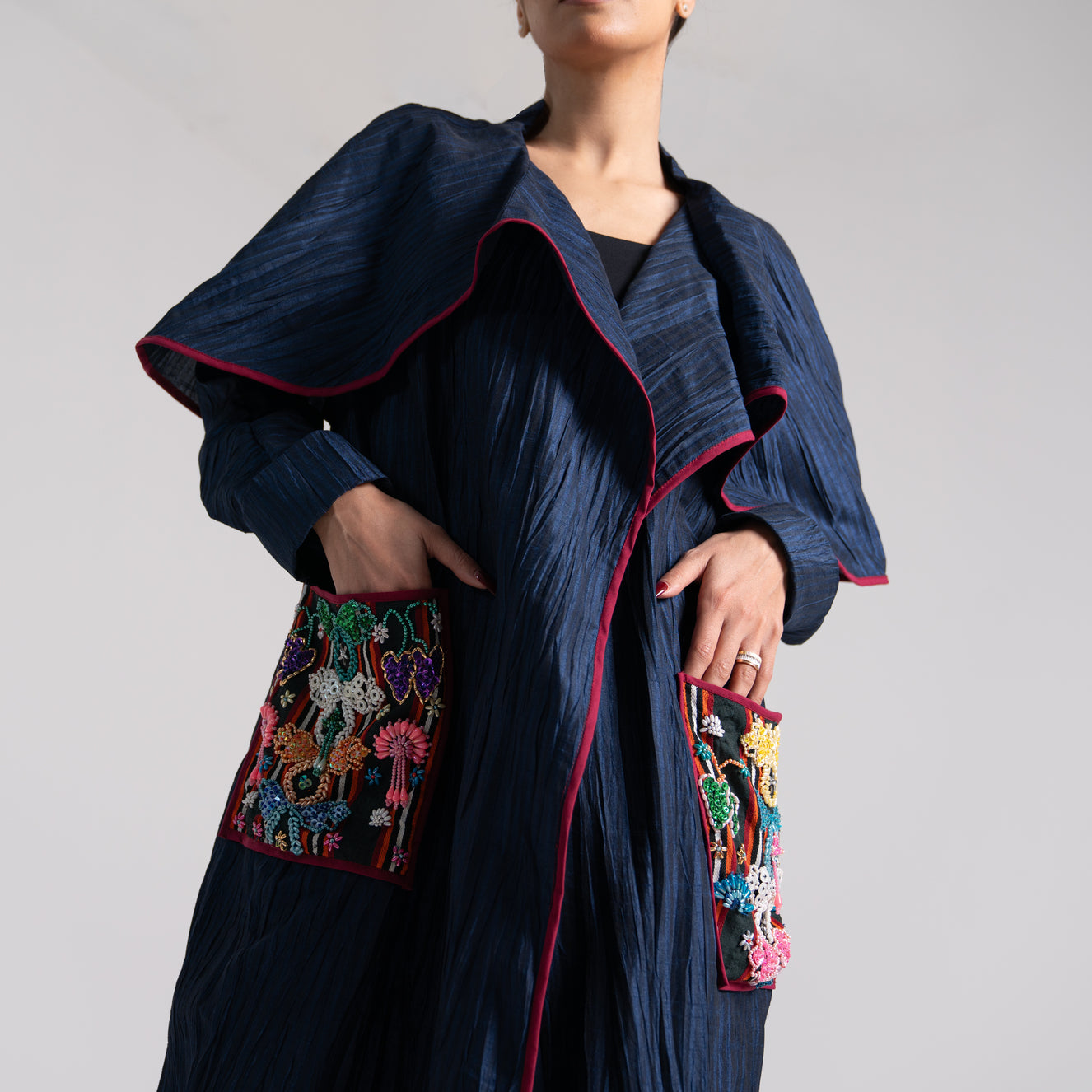 DALSH DESIGNS - Pleated coat with siwa embroidery